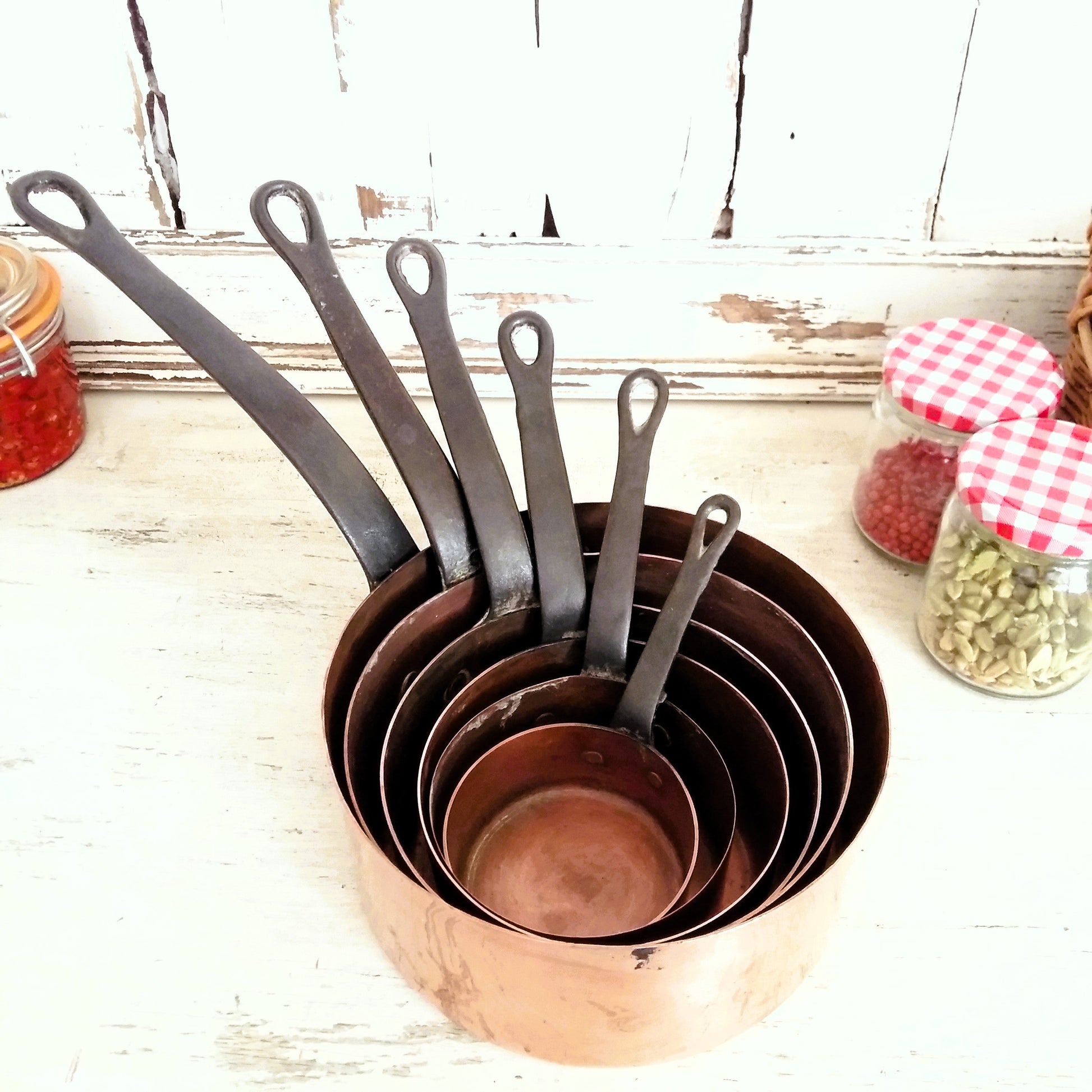 SIX Copper Pans with Cast Iron Handles from Tiggy & Pip - Just €180! Shop now at Tiggy and Pip