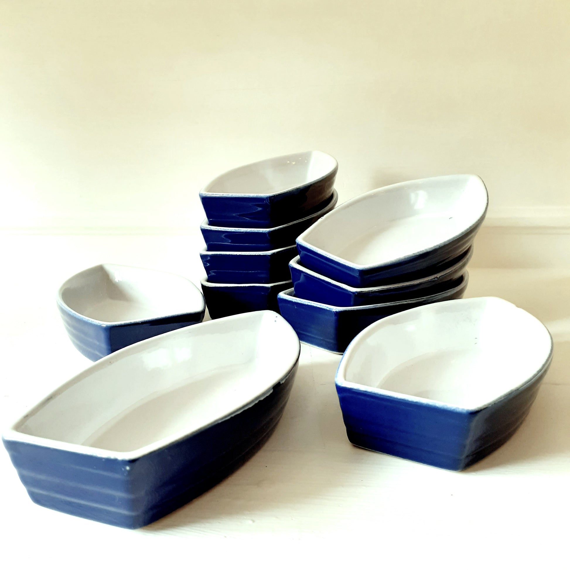 TEN Blue & White Boat Shaped Dishes from Tiggy & Pip - Just €98! Shop now at Tiggy and Pip